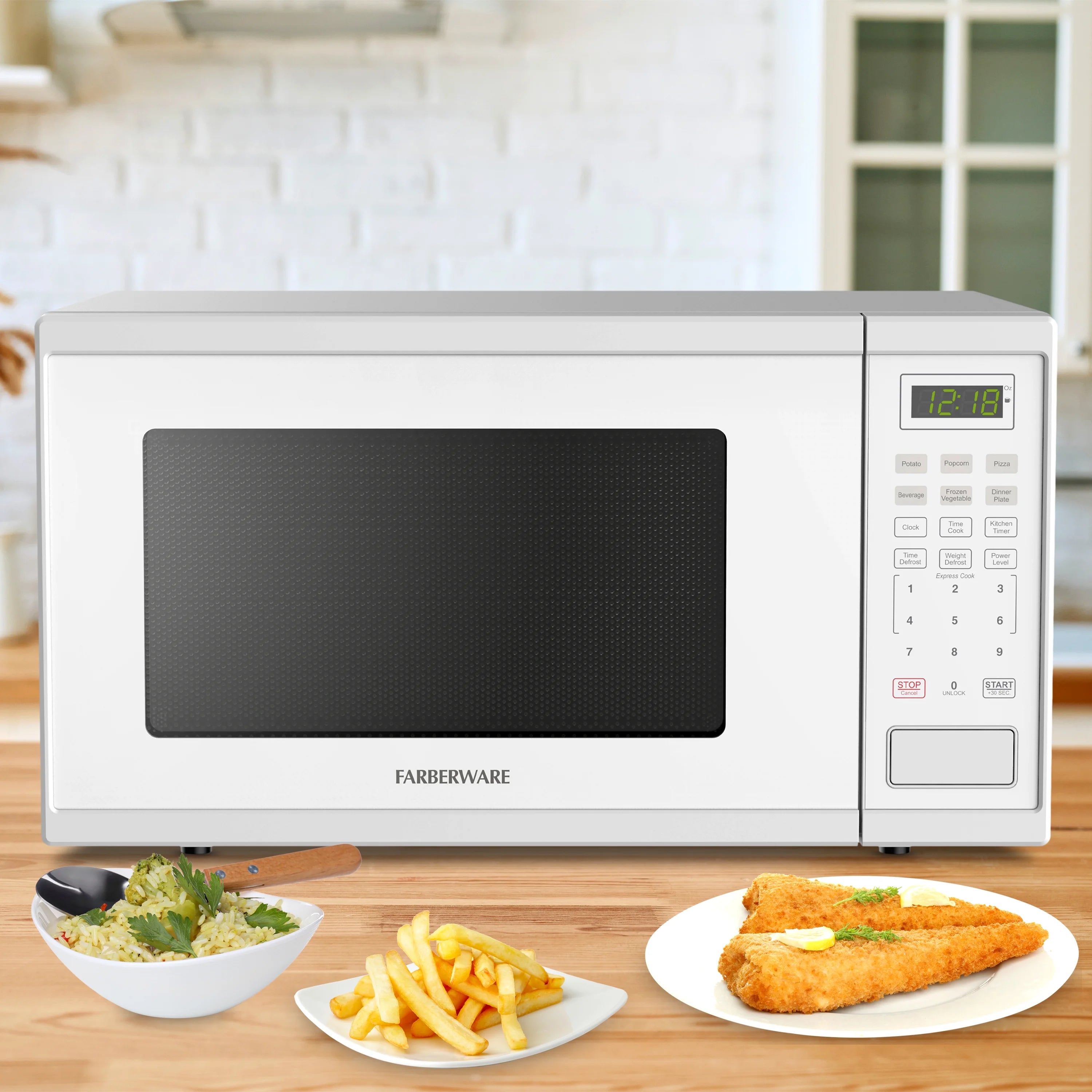 Farberware Countertop Microwave Ov 1100 Watts. 2.2 cu ft - Smart Sensor With LED Lighting and Child Lock - Perfect for Apartments and Dorms - Easy Clean Black Interior. Stainless Steel
