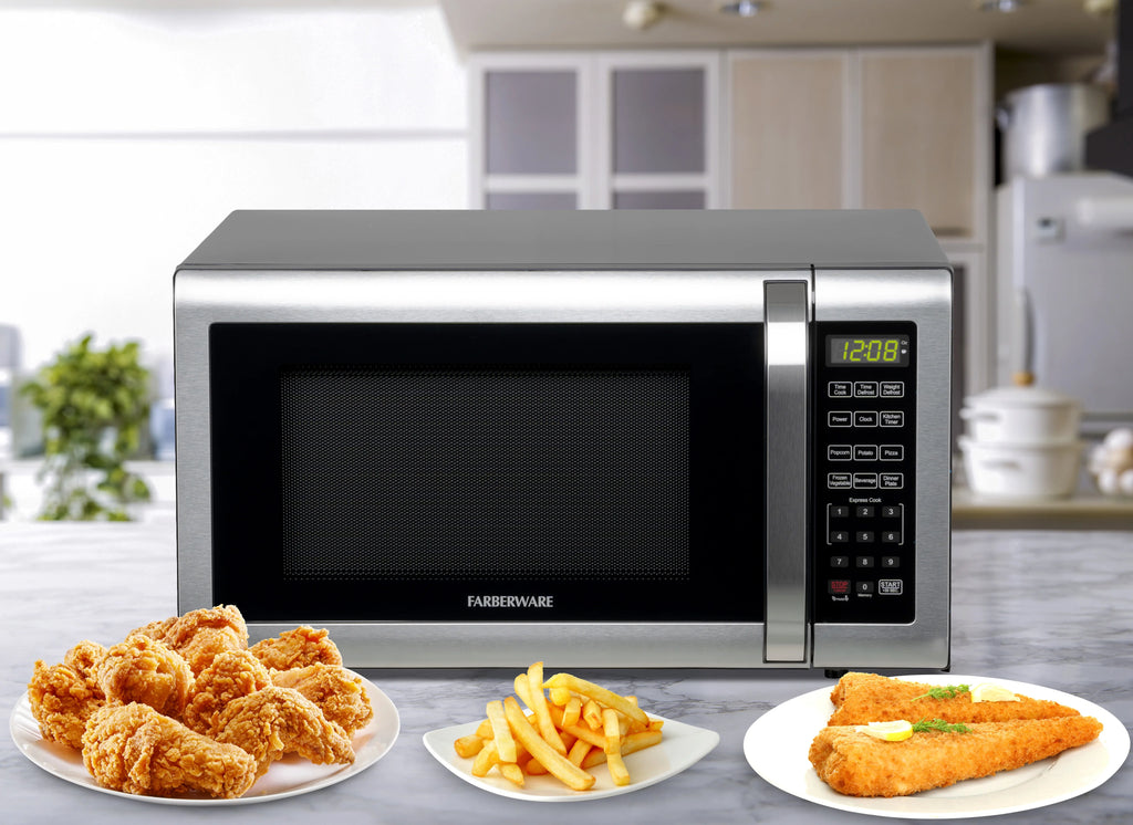 Farberware Countertop Microwave Ov 1100 Watts. 2.2 cu ft - Smart Sensor With LED Lighting and Child Lock - Perfect for Apartments and Dorms - Easy Clean Black Interior. Stainless Steel