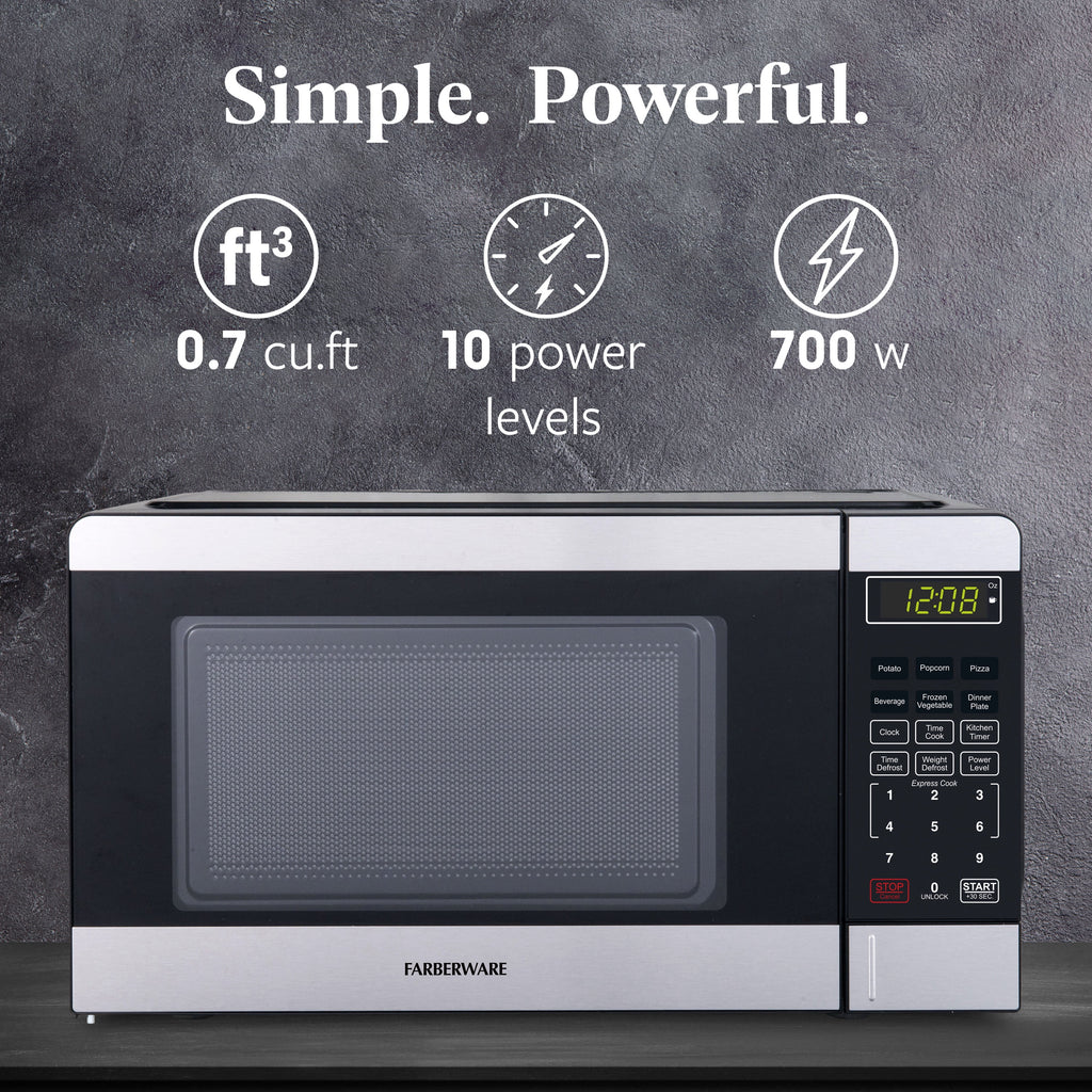 Farberware Countertop Microwave Ov 1100 Watts. 2.2 cu ft - Smart Sensor With LED Lighting and Child Lock - Perfect for Apartments and Dorms - Easy Clean Black Interior. Stainless Steel