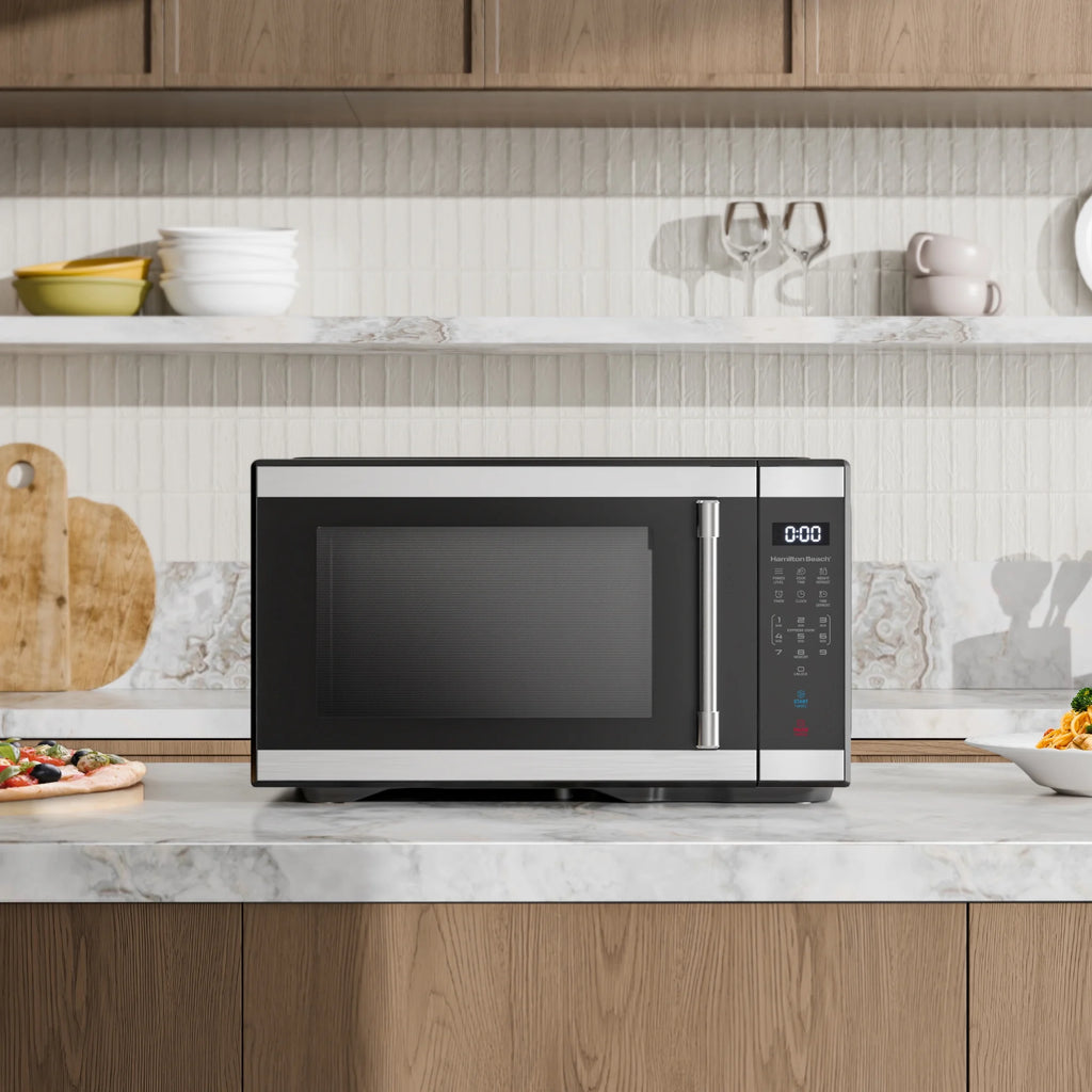Hamilton Beach 1.1 cu ft Countertop Microwave Oven. Black and Stainless Steel