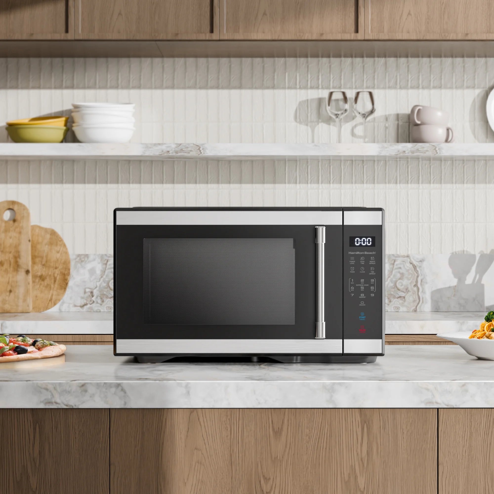 Hamilton Beach 1.1 cu ft Countertop Microwave Oven. Black and Stainless Steel