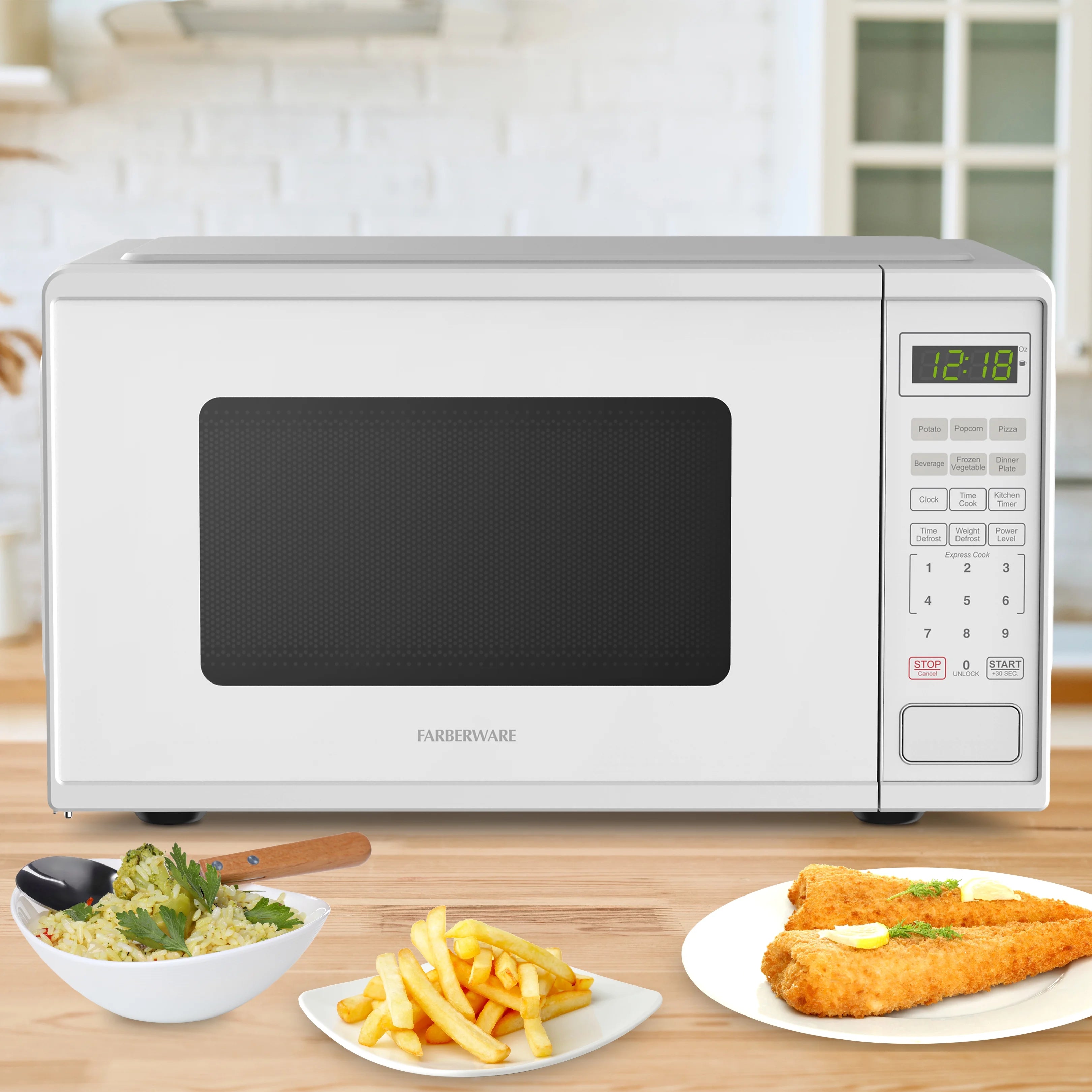 Farberware Countertop Microwave Ov 1100 Watts. 2.2 cu ft - Smart Sensor With LED Lighting and Child Lock - Perfect for Apartments and Dorms - Easy Clean Black Interior. Stainless Steel