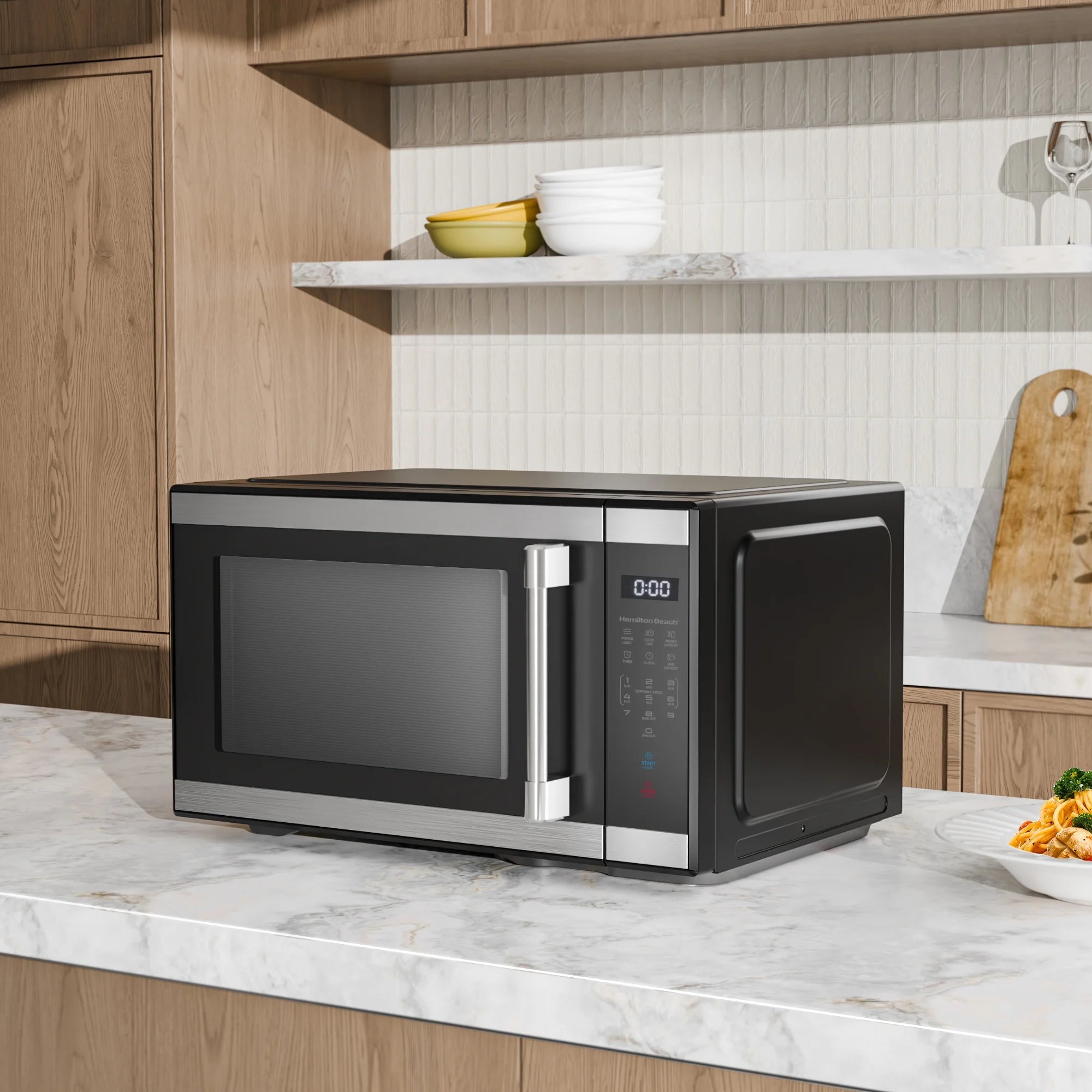 Hamilton Beach 1.1 cu ft Countertop Microwave Oven. Black and Stainless Steel