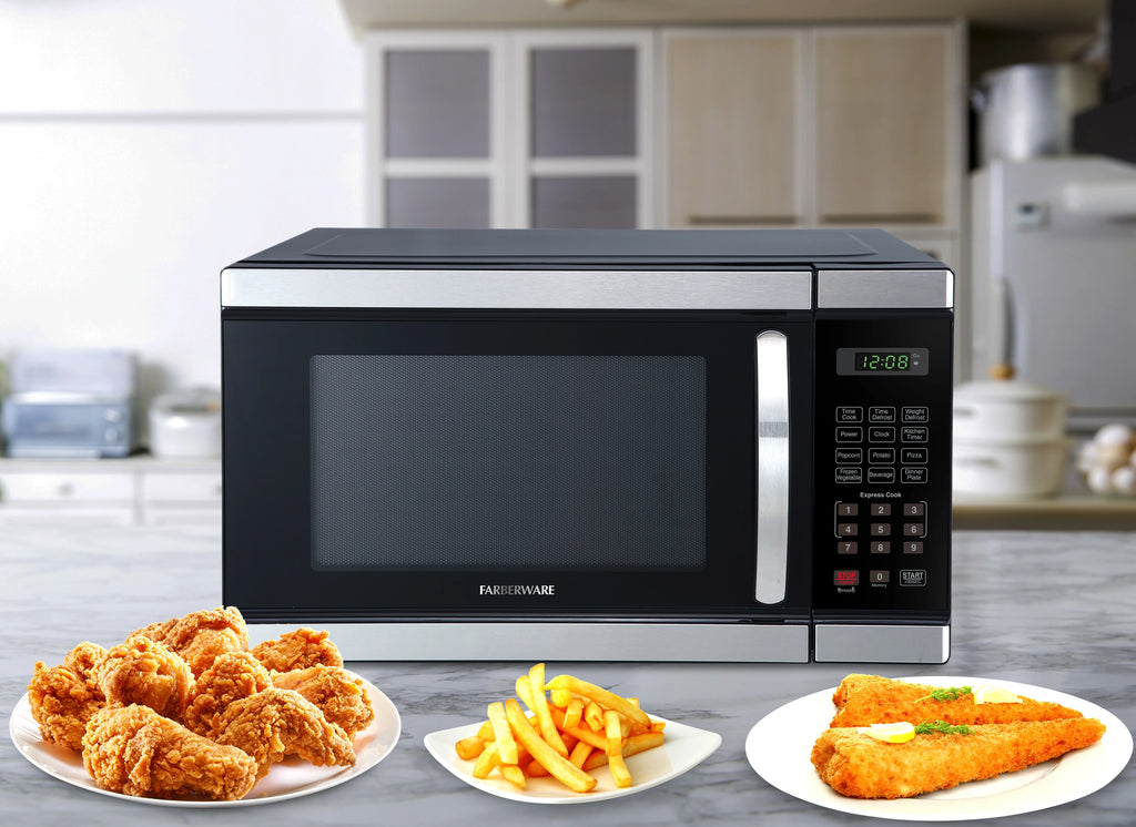 Farberware Countertop Microwave Ov 1100 Watts. 2.2 cu ft - Smart Sensor With LED Lighting and Child Lock - Perfect for Apartments and Dorms - Easy Clean Black Interior. Stainless Steel