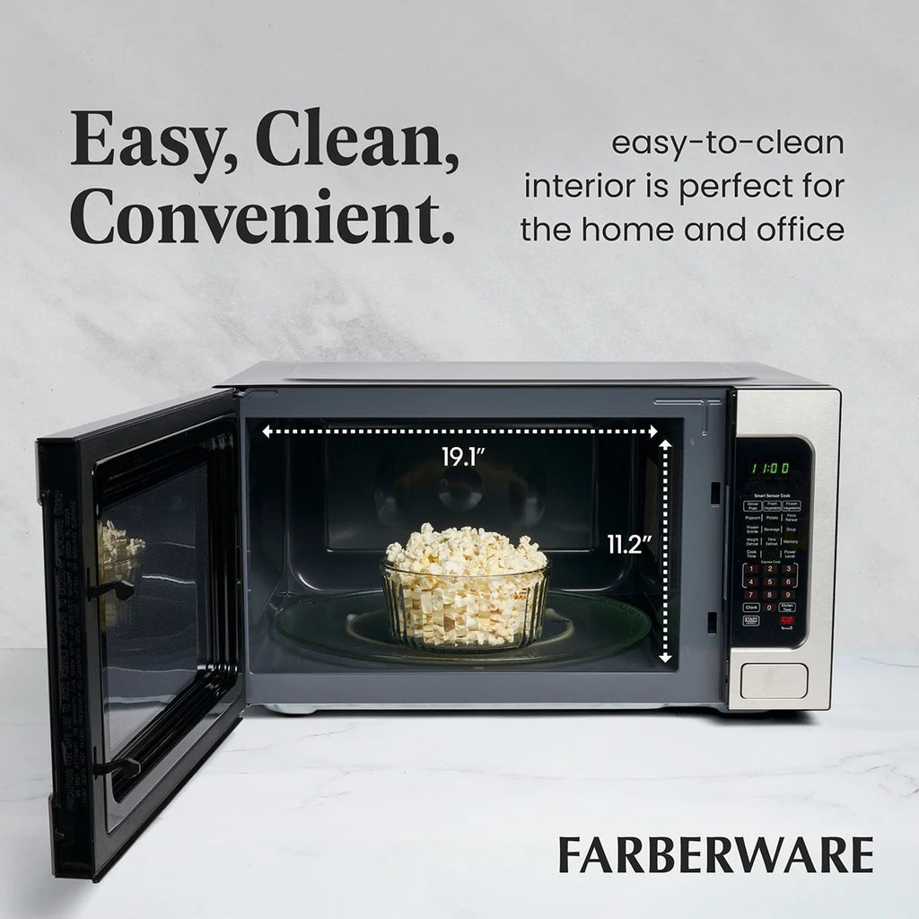 Farberware Countertop Microwave Ov 1100 Watts. 2.2 cu ft - Smart Sensor With LED Lighting and Child Lock - Perfect for Apartments and Dorms - Easy Clean Black Interior. Stainless Steel